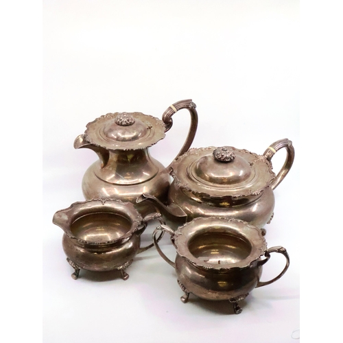 311 - A four piece silver tea service, consisting of a silver teapot, hot water pot, sugar bowl and cream ... 