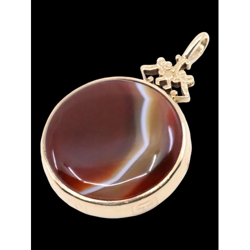 104 - A 9ct gold stone set fob approx. 19.7 grams, length 2 inches, diameter 1.25 inches