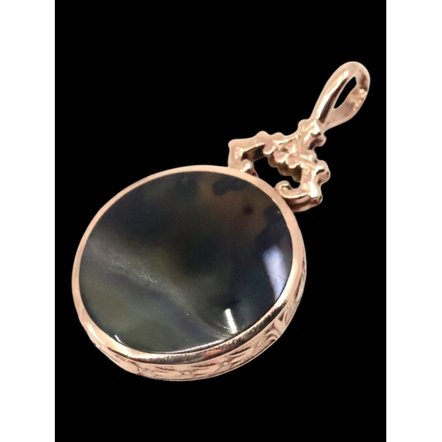 105 - A 9ct gold stone set fob approx. 14.6 grams, length 1.75  inches, diameter 1 inches