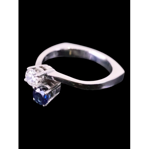 11 - A diamond and sapphire ring, set in 18ct gold, showing as finger size N approx. 4.8 grams, estimated... 