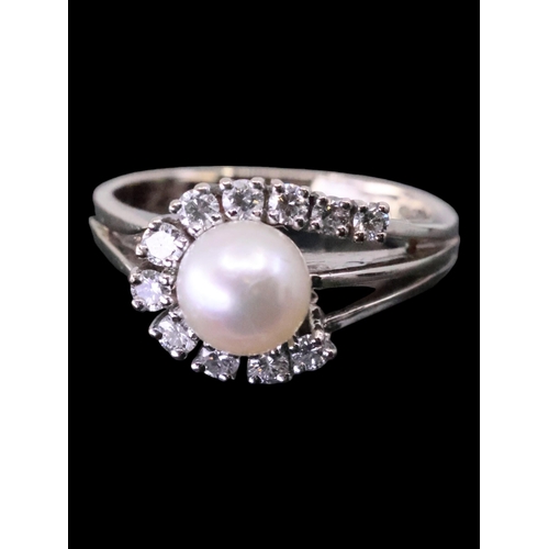 15 - A diamond and pearl ring, finger size L approx. 5 grams, total estimated weight of diamonds 0.44cts