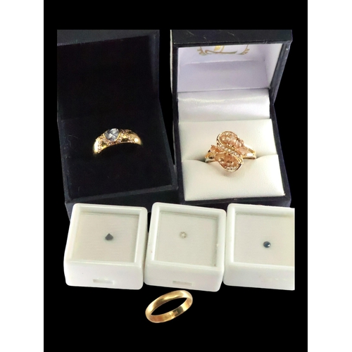 150 - An 18ct gold wedding ring approx. 2.5 grams finger size K and two gold plated rings and three gem st... 