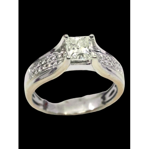 24 - A diamond solitaire ring set in 18ct gold with a copy of a valuation which states the diamond is 1.0... 