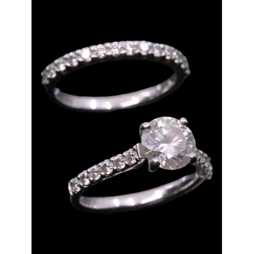 26 - A platinum set engagement ring and a platinum set wedding ring approx. 7.5 grams finger size L