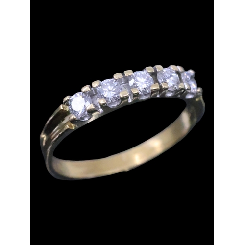 31 - A diamond five stone ring set in 18ct gold finger size O