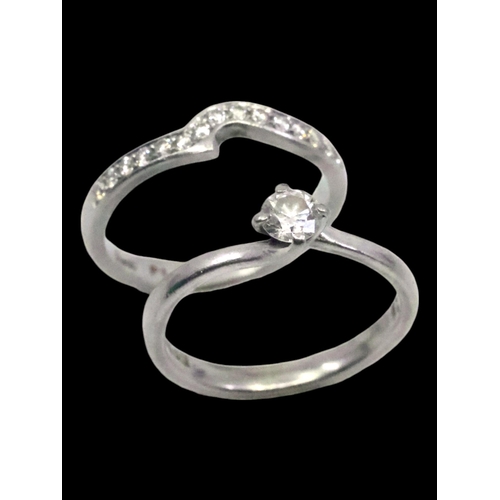 35 - A diamond solitaire ring set in platinum estimated weight of diamond 0.28cts finger size L and a dia... 