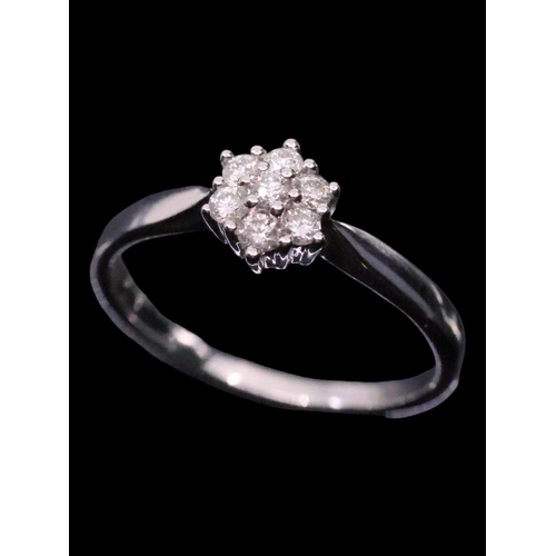 51 - An 18ct gold diamond cluster ring finger size O, total estimated weight of diamond 0.25cts