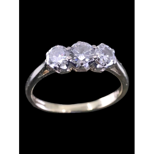 55 - A diamond three stone ring set in 18ct gold total estimated weight of diamonds 1ct finger size N wit... 