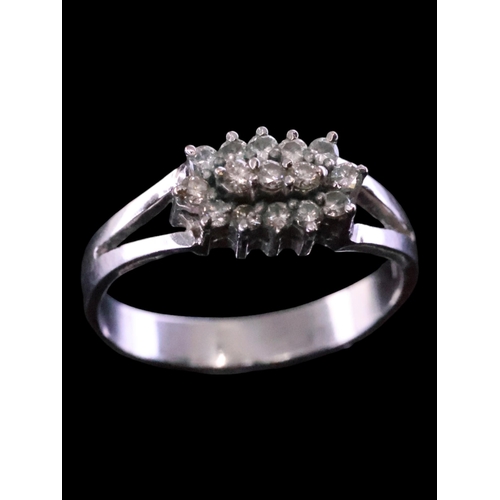 60 - A diamond cluster ring finger size N