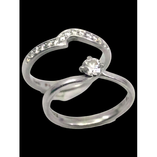 11 - A diamond solitaire ring set in platinum estimated weight of diamond 0.28cts finger size L and a dia... 