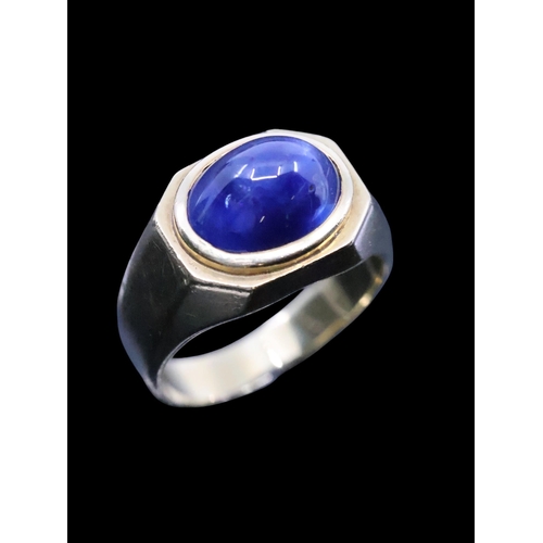 144 - A cabochon sapphire ring set in 18ct gold, estimated weight of sapphire 5cts, finger size Q