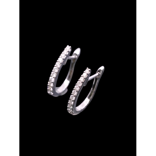 155 - A pair of diamond set earrings approx. 3.1 grams