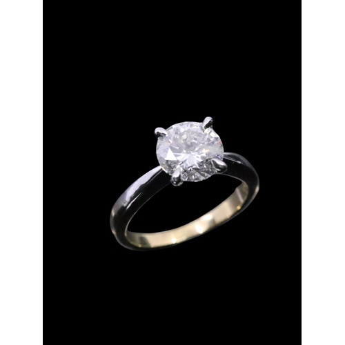 16 - A diamond solitaire ring set in 18ct gold, estimated weight of diamond 2.15cts finger size M