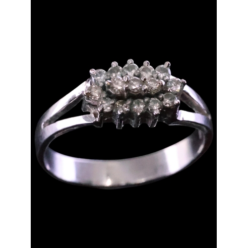 19 - A diamond cluster ring finger size N