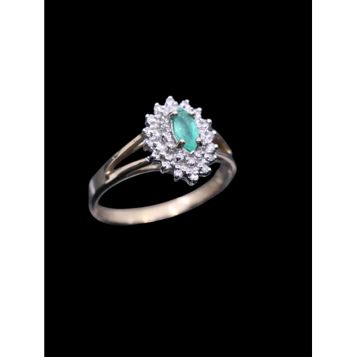 192 - An emerald and diamond cluster ring set in 9ct gold, finger size L