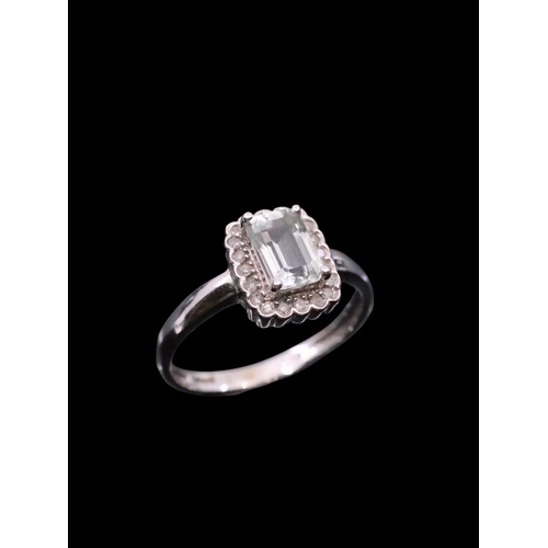 198 - An gem and diamond ring set in 9ct gold, finger size N