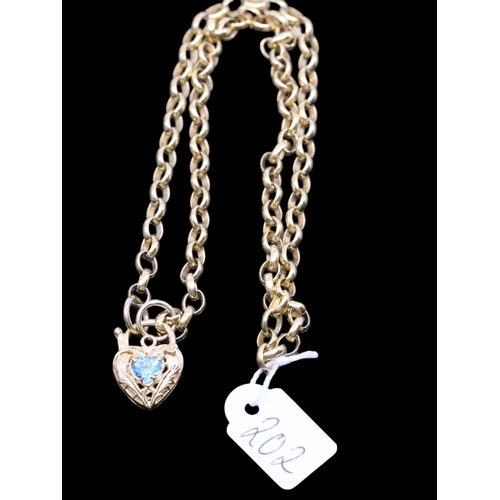 202 - A gold pendant and chain, total weight 17.7 grams length of chain 17 inches