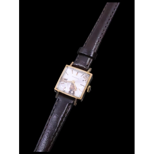 264 - A 9ct gold Longines watch