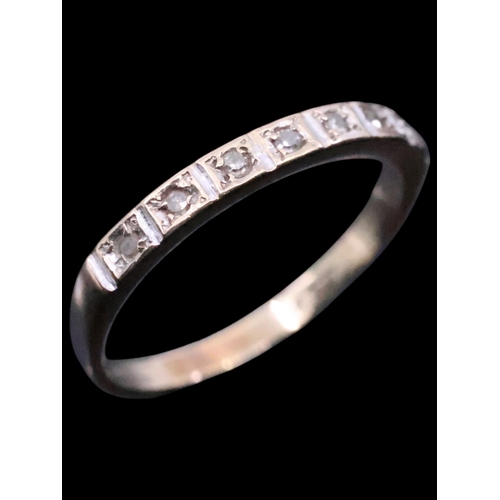 41 - A diamond set half eternity ring approx. 1.5 grams finger size L 1/2