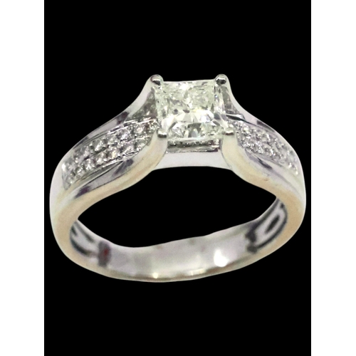 5 - A diamond solitaire ring set in 18ct gold with a copy of a valuation which states the diamond is 1.0... 