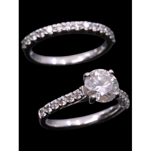 6 - A platinum set engagement ring and a platinum set wedding ring approx. 7.5 grams finger size L