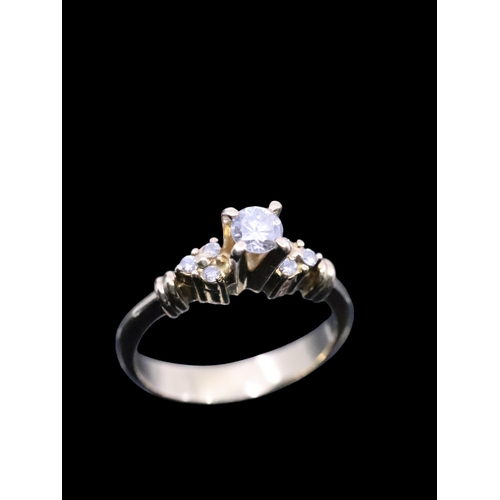 97 - An 18ct gold diamond solitaire ring finger size L