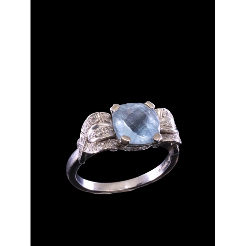 1 - An aquamarine and diamond cluster ring set in 18ct gold finger size O