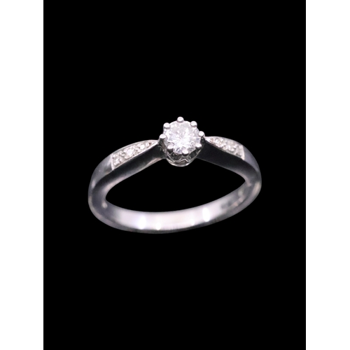 11 - A diamond solitaire ring in 18ct gold estimated weight of diamond 0.30cts, finger size M and a half