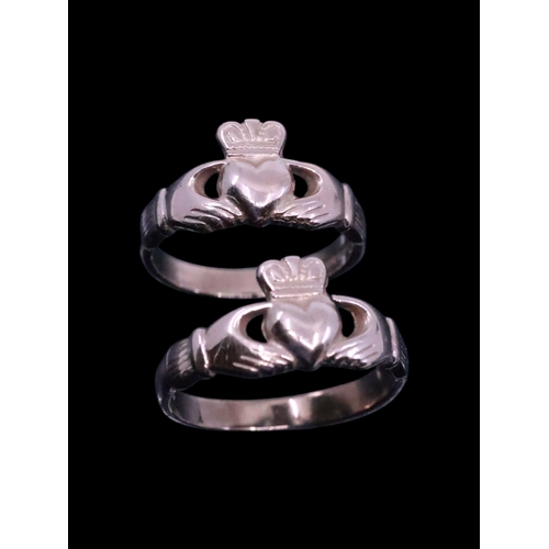 127 - Two 9ct gold claddagh rings approx. 6.6 grams, finger sizes Q & M