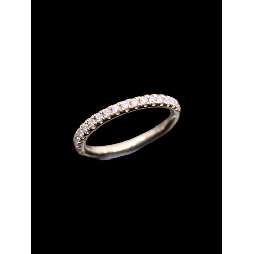 142 - A diamond half eternity ring set in 18ct gold, total estimated weight of diamonds 0.21cts finger siz... 