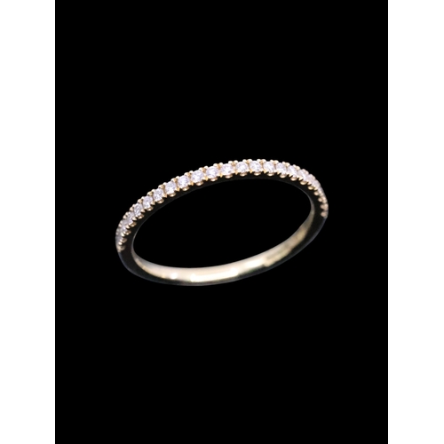 143 - A diamond half eternity ring set in 18ct gold, total estimated weight of diamonds 0.17cts finger siz... 