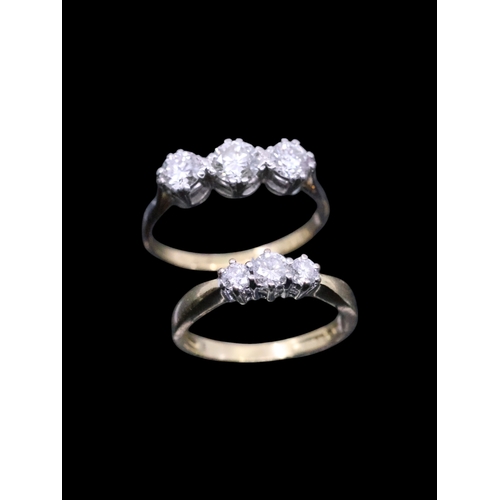 152 - Two 18ct gold diamond rings, showing as finger size M and J. Total estimated of diamonds .33cts