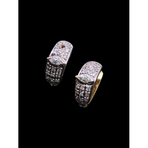 155 - A pair of 14ct diamond earrings, total weight approx. 3.9 grams (one stone missing)