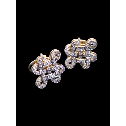 156 - A pair of 14ct diamond earrings, total weight approx 4.9 grams