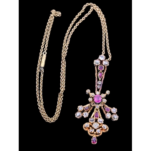 167 - An 18ct diamond and ruby necklace, total weight approx. 13.6g and length approx. 16 inches with a 2 ... 