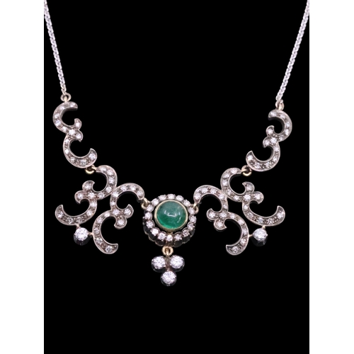 168 - An 18ct diamond and emerald necklace, total weight approx. 13.6g and length approx. 18 inches with a... 