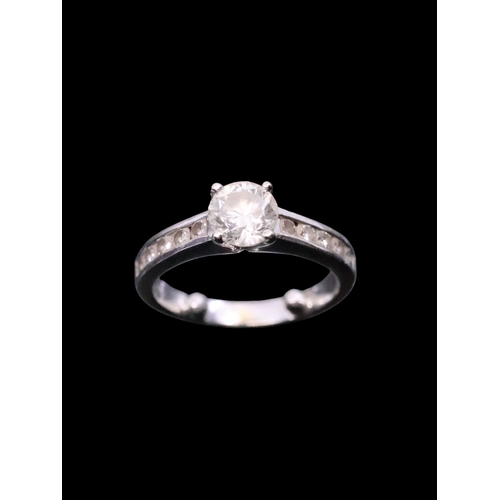 41 - A diamond solitaire ring set in 18ct gold, with a copy of IGI cert which states it is 0.90cts K colo... 