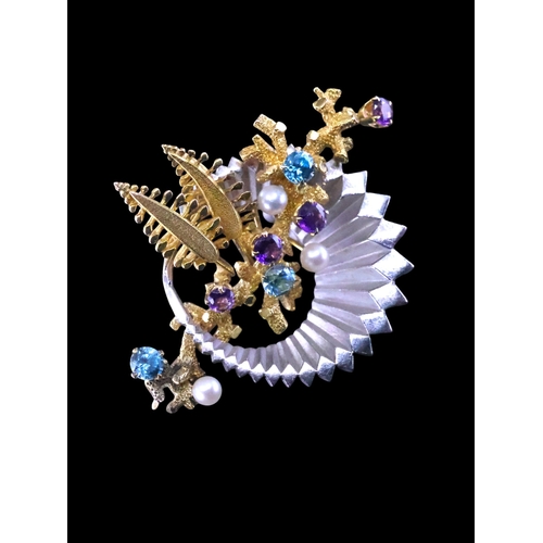 43 - A multi gem set 9ct gold gold brooch by Alabaster and Wilson approx. 13.7 grams