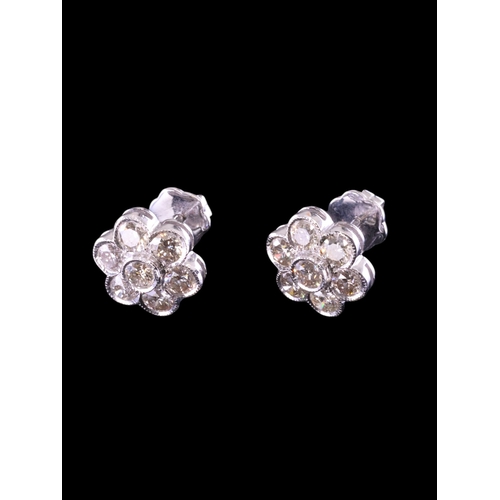 5 - A pair of diamond daisy earrings, total estimated weight of diamonds 2.22cts