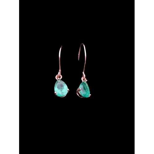 60 - A pair of emerald set earrings