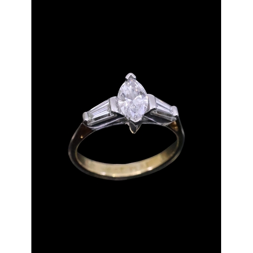 63 - A diamond solitaire ring set in 18ct gold by West finger size J