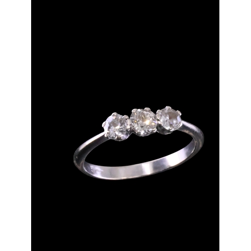 8 - A diamond three stone ring finger size R