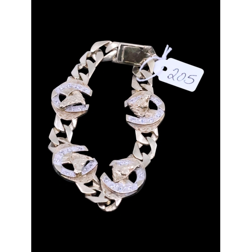 205 - A gents gold horseshoe bracelet approx. 37.6 grams