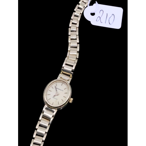 210 - A ladies gold watch