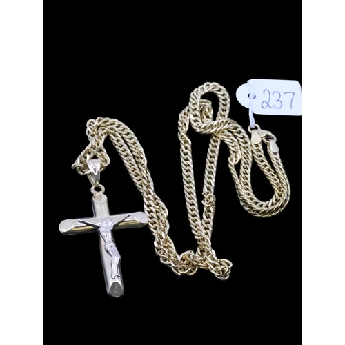 237 - An 18ct gold cross and chain approx. 14.5 grams