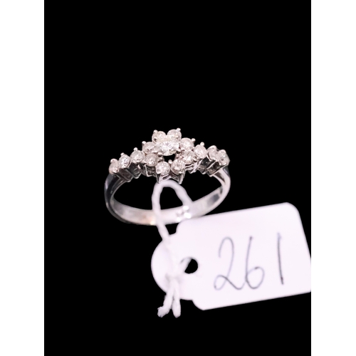 261 - A 14ct cluster diamond ring