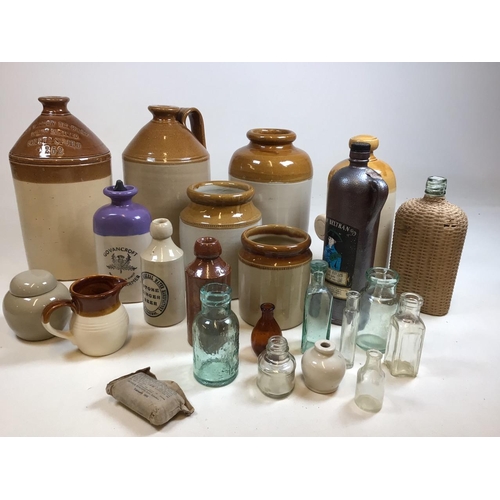 A quantity of stoneware flagons, The Baddow Brewery, Chelmsford, stoneware jars, foot warmers and gl