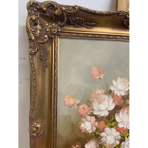 34 - Robert Cox 20th British, oil on canvas of flowers in gilt frame. Canvas size W:40cm x H:50cm