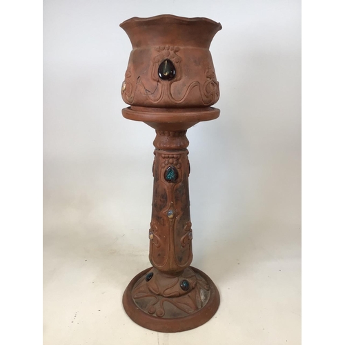 50 - Large terracotta Bretby jardiniere and stand. AF, some losses. Planter 30cm diameter.W:38cm x D:38... 