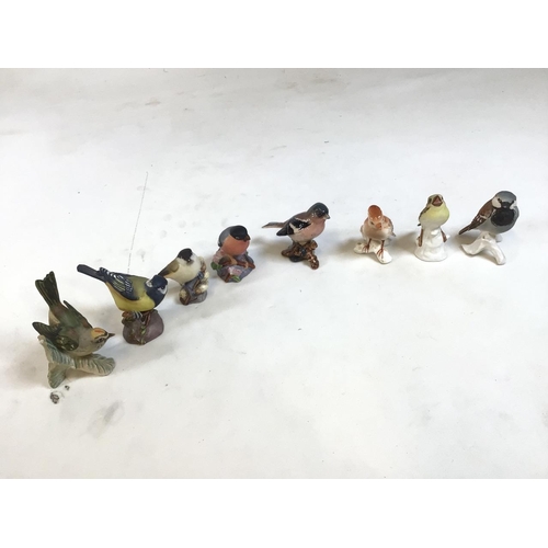 53 - 8 ceramic bird figures, from Royal Worcester, Goebel of West Germany and Beswick. Bullfinch, Great T... 
